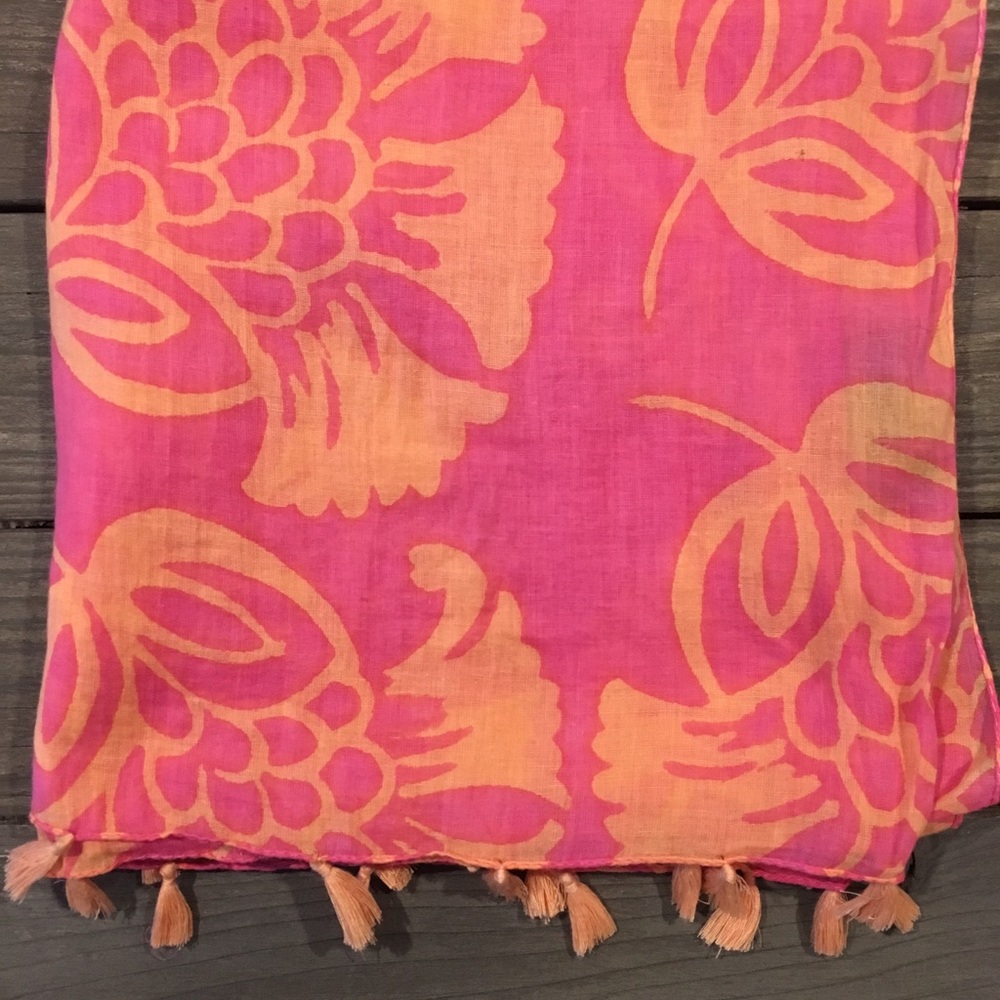 Pink and orange tasseled scarf